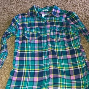 Plaid long sleeve or cardigan.